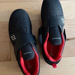 Peloton Black Shoes with Vibrant Red Lining